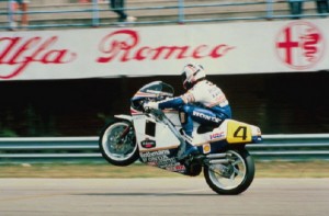 Wayne Gardner popping a wheelie